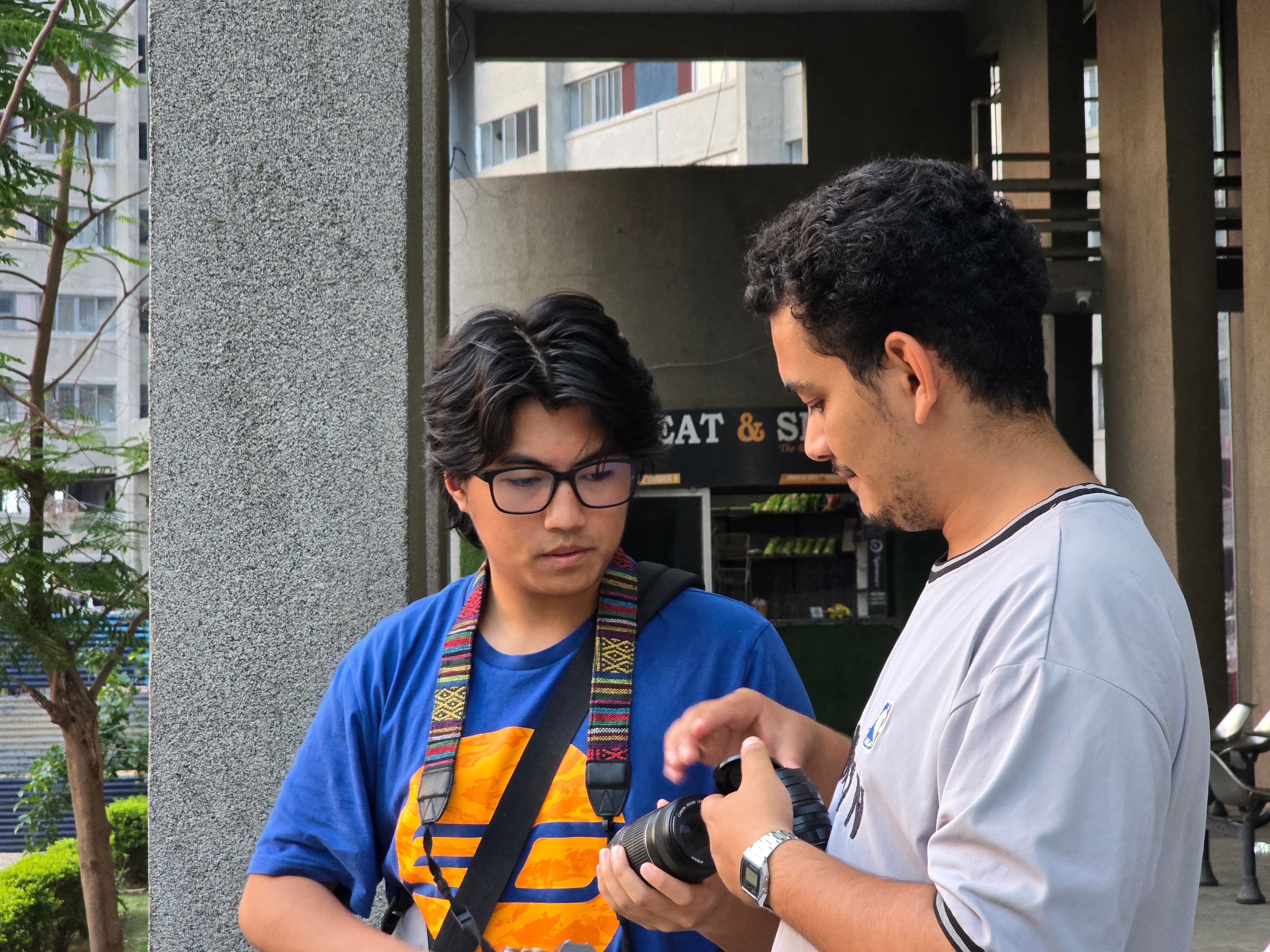 Jasim holding a camera